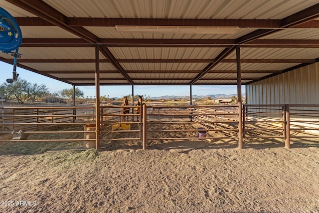 view of stable featuring a rural view