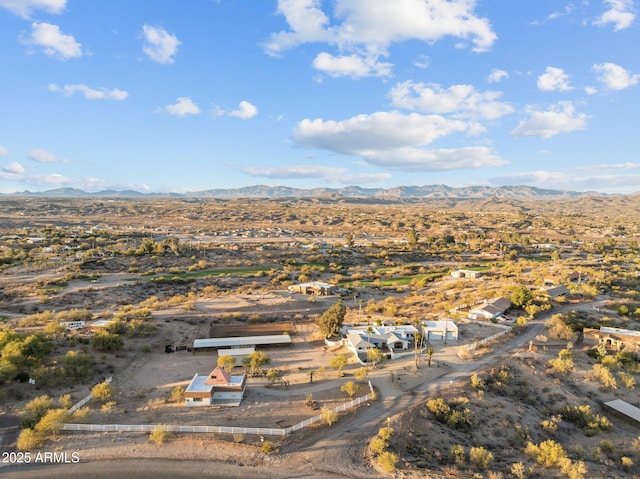 birds eye view of property with a mountain view