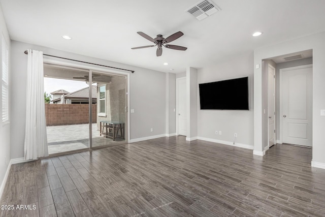 unfurnished living room with ceiling fan, wood finished floors, baseboards, and recessed lighting