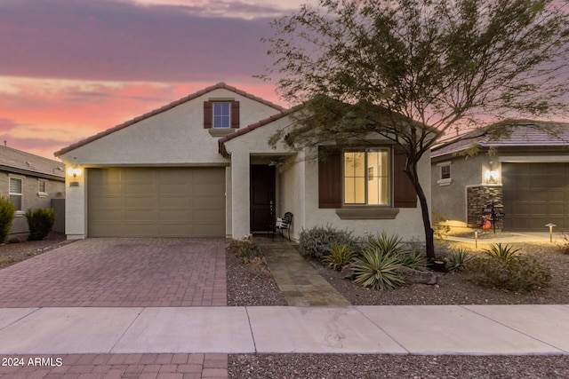 view of front of home with a garage