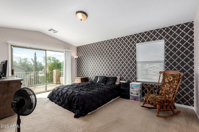 carpeted bedroom with visible vents, lofted ceiling, access to outside, and wallpapered walls