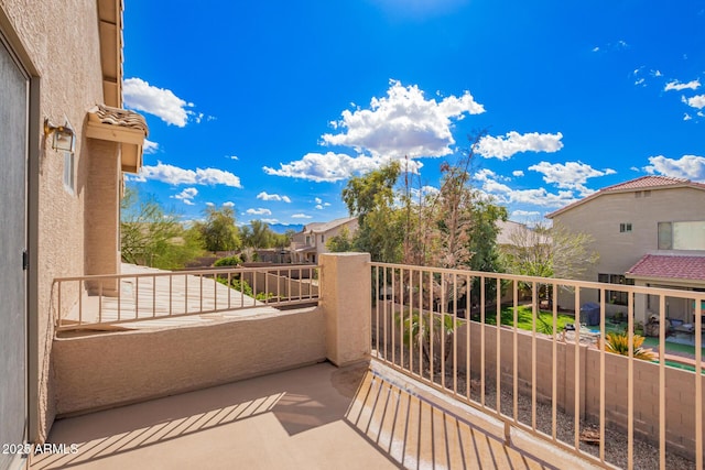 balcony featuring a residential view