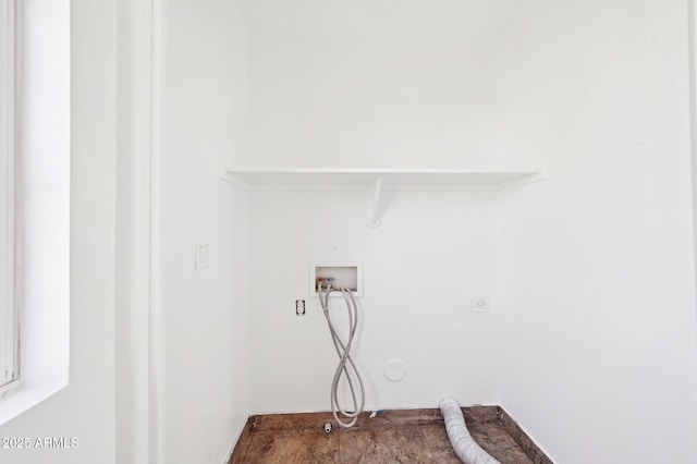 laundry room featuring laundry area, hookup for a washing machine, electric dryer hookup, and hookup for a gas dryer