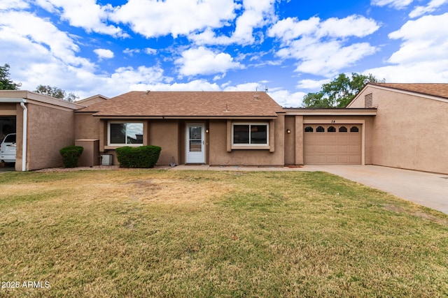 ranch-style home with a front lawn, a garage, driveway, and stucco siding