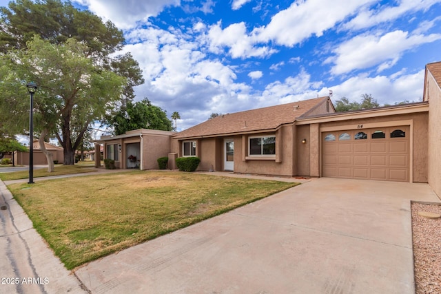 single story home featuring a garage, concrete driveway, a front yard, and stucco siding