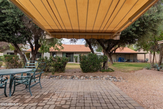 view of patio with outdoor dining space