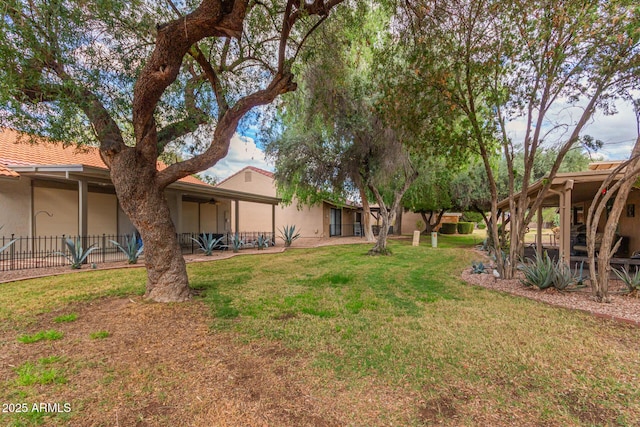 view of yard with a patio and fence