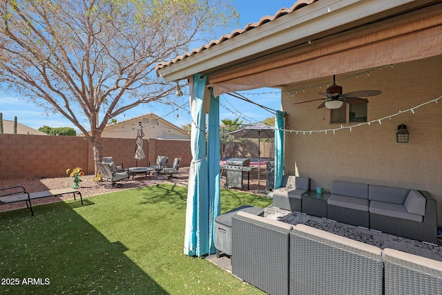 view of yard featuring ceiling fan, a patio area, fence, and an outdoor hangout area