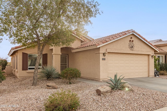 view of front of property with a garage