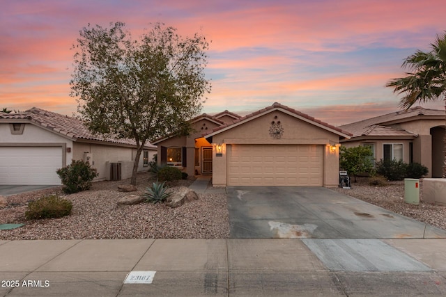 view of front of home with a garage