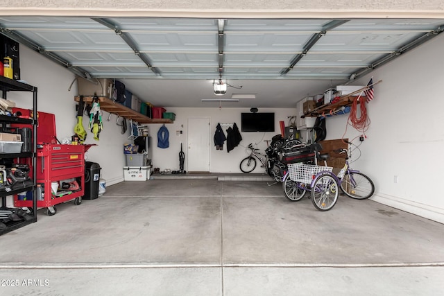 garage featuring a garage door opener