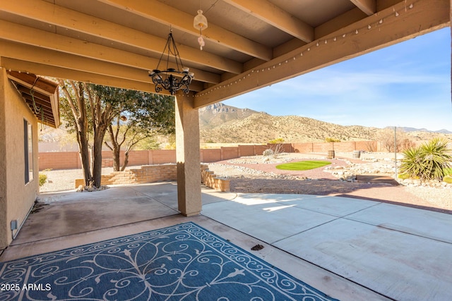 view of patio with a mountain view