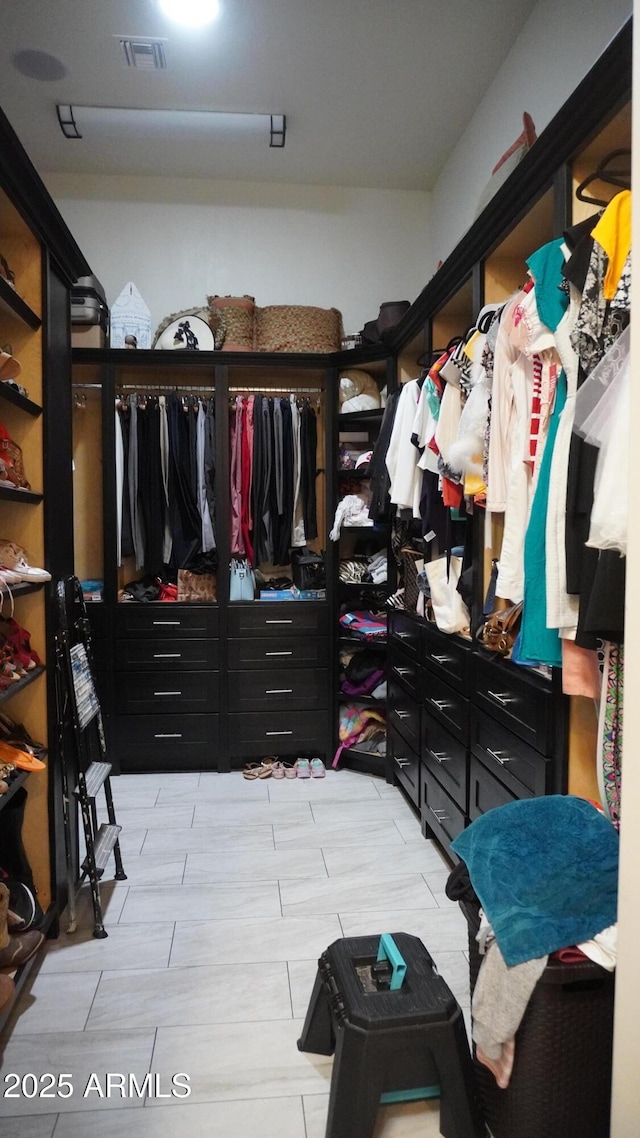 spacious closet with visible vents