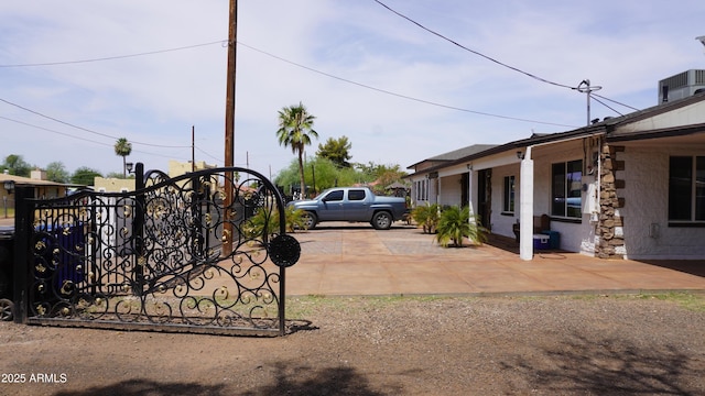 view of yard featuring fence and cooling unit