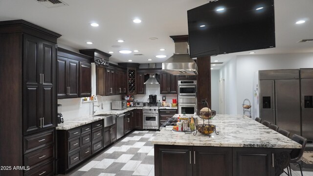 kitchen featuring visible vents, a sink, stainless steel appliances, and recessed lighting