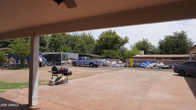 view of parking featuring ceiling fan