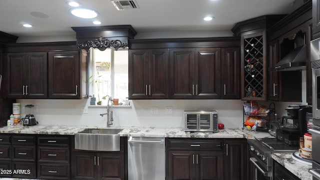 kitchen with visible vents, dark brown cabinets, a sink, light stone counters, and stainless steel electric stove