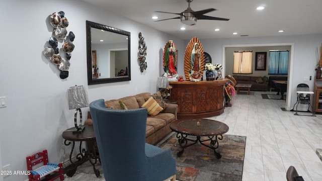 living area with recessed lighting and ceiling fan