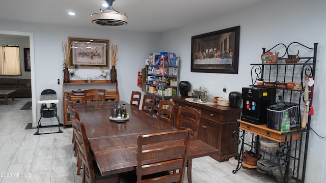 dining room featuring recessed lighting