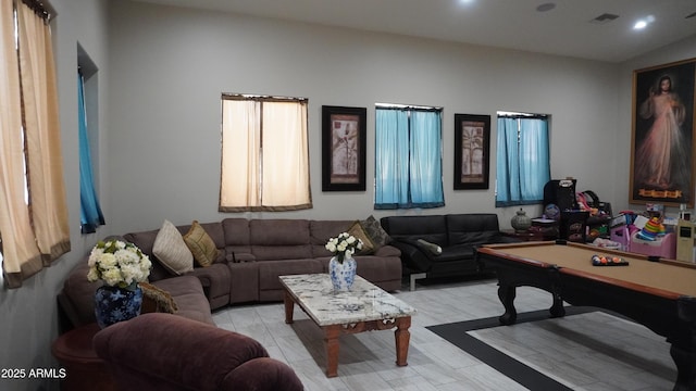 living room with billiards and recessed lighting