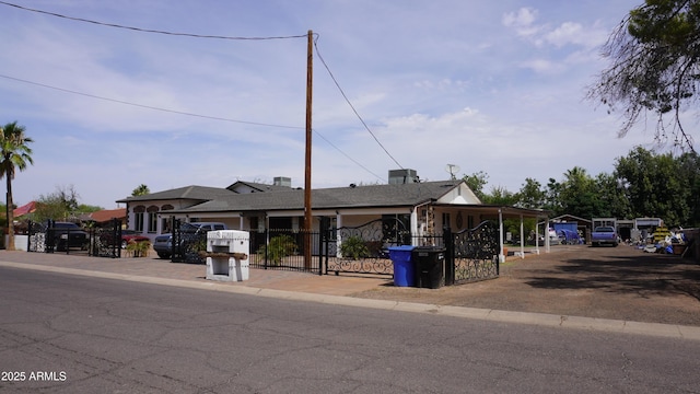 view of front of home with a gate and fence