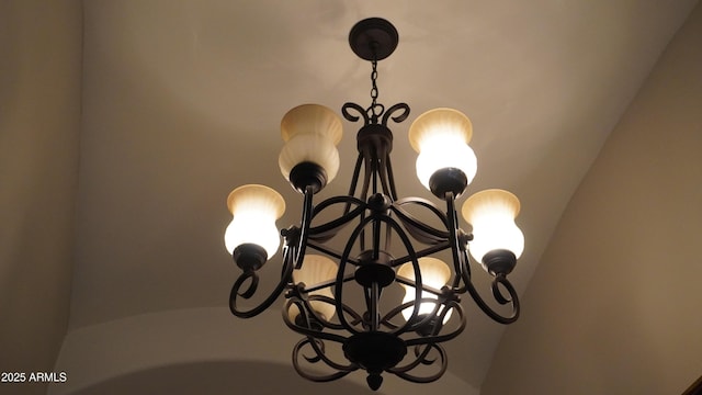 interior details featuring a notable chandelier