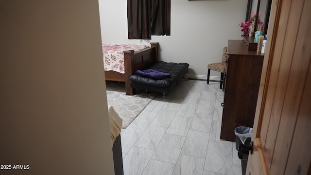 bedroom with baseboards