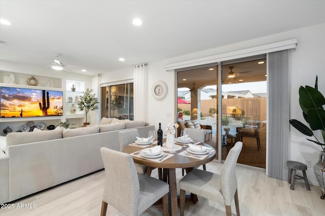 dining space featuring recessed lighting, visible vents, light wood finished floors, and ceiling fan