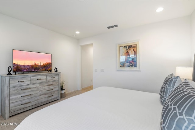 bedroom with recessed lighting, carpet, and visible vents