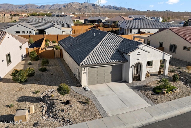 bird's eye view with a mountain view and a residential view