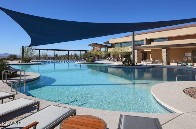 pool featuring a patio area