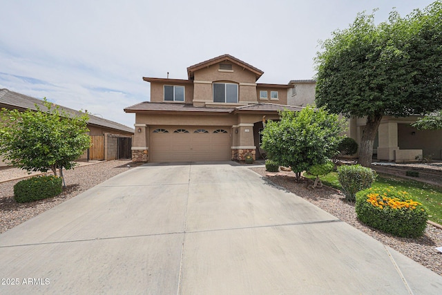 11563 W Jefferson St, Avondale, AZ 85323 - view of front facade featuring stucco siding, stone siding, concrete driveway, and an attached garage