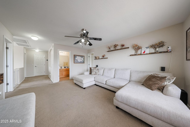 11563 W Jefferson St, Avondale, AZ 85323 - living area with light carpet and a ceiling fan