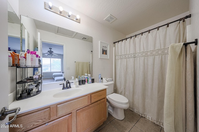 11563 W Jefferson St, Avondale, AZ 85323 - full bathroom featuring toilet, tile patterned flooring, and vanity