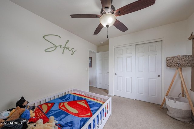 11563 W Jefferson St, Avondale, AZ 85323 - bedroom with light colored carpet, a closet, and a ceiling fan