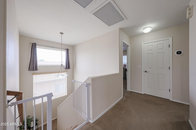 11563 W Jefferson St, Avondale, AZ 85323 - hallway featuring an upstairs landing, carpet, and baseboards