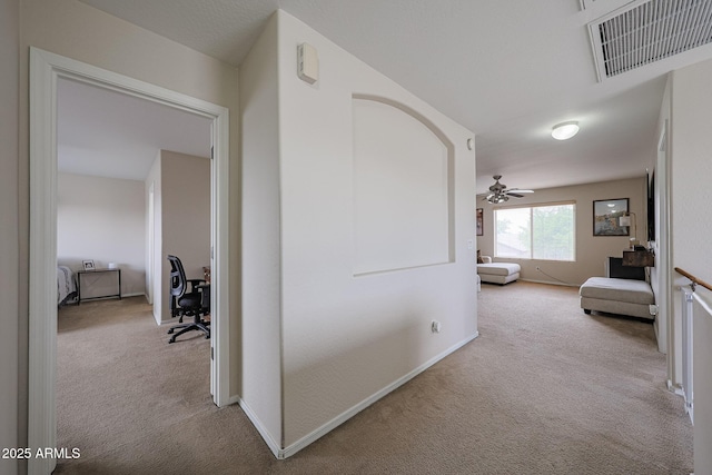 11563 W Jefferson St, Avondale, AZ 85323 - hall with carpet floors, a desk, and baseboards