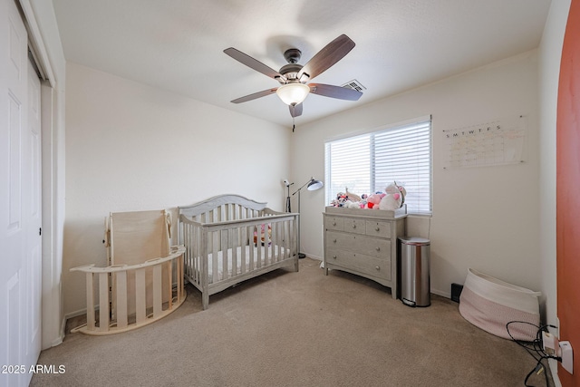 11563 W Jefferson St, Avondale, AZ 85323 - bedroom with carpet floors, a closet, ceiling fan, and a nursery area