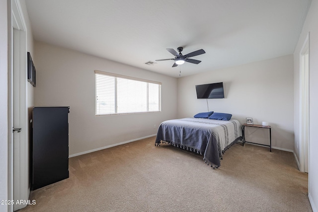 11563 W Jefferson St, Avondale, AZ 85323 - bedroom with light colored carpet, baseboards, and ceiling fan