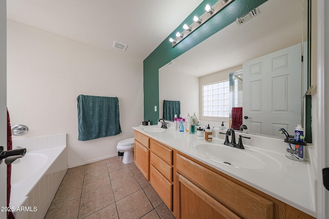 11563 W Jefferson St, Avondale, AZ 85323 - bathroom with double vanity, a bath, toilet, tile patterned flooring, and a shower