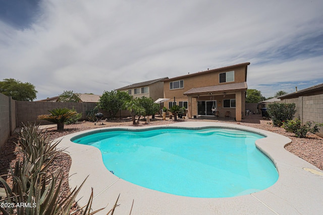11563 W Jefferson St, Avondale, AZ 85323 - view of swimming pool with a fenced backyard and a patio area