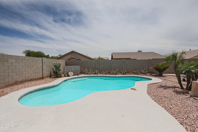 11563 W Jefferson St, Avondale, AZ 85323 - view of swimming pool featuring a patio area and a fenced backyard