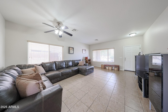 11563 W Jefferson St, Avondale, AZ 85323 - living room with a ceiling fan and light tile patterned floors