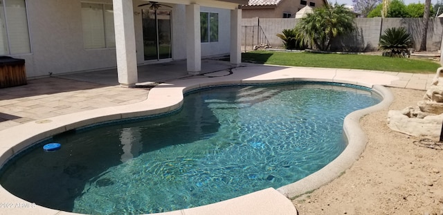 view of pool featuring a patio