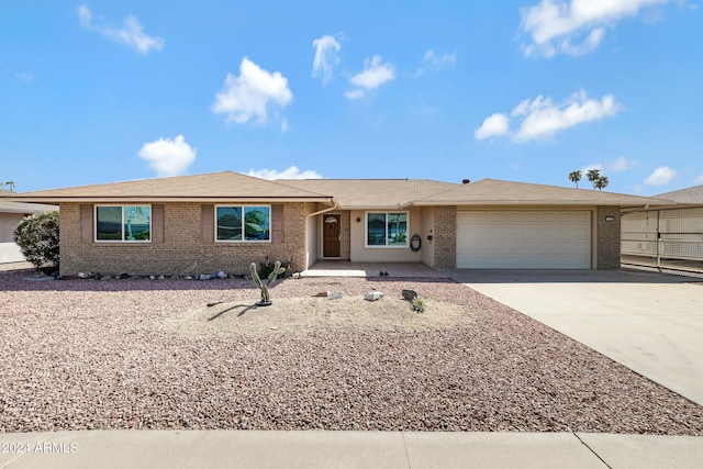 ranch-style home with a garage