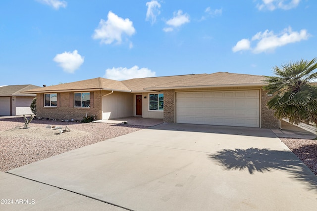 single story home with a garage