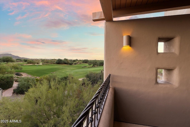 balcony at dusk with a mountain view