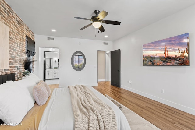 bedroom featuring light wood-type flooring and ceiling fan