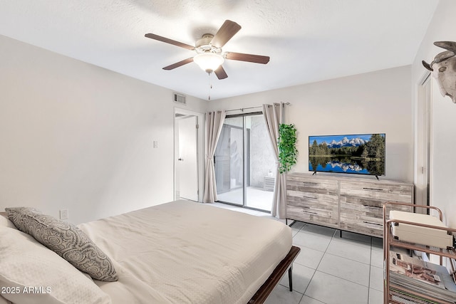 bedroom with light tile patterned floors, access to outside, visible vents, and a ceiling fan