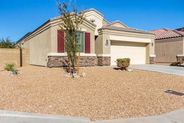 view of front of property featuring a garage